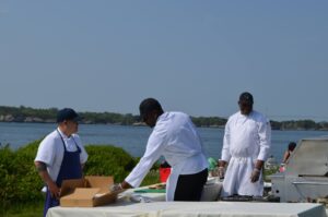 Cooks prepare for outdoor grill